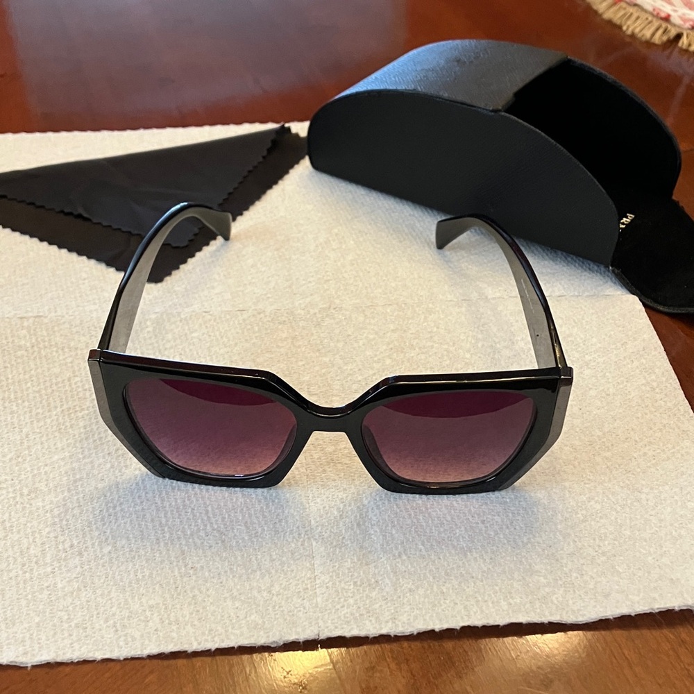 PRADA. Chic Black Sunglasses. Lenses have purple/maroon tint. SHARP LOOKING. EUC